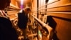 New York State Governor Andrew Cuomo peers into the cell that inmates escaped from at a maximum-security prison near the Canadian border in Dannemora, N.Y., June 6, 2015.