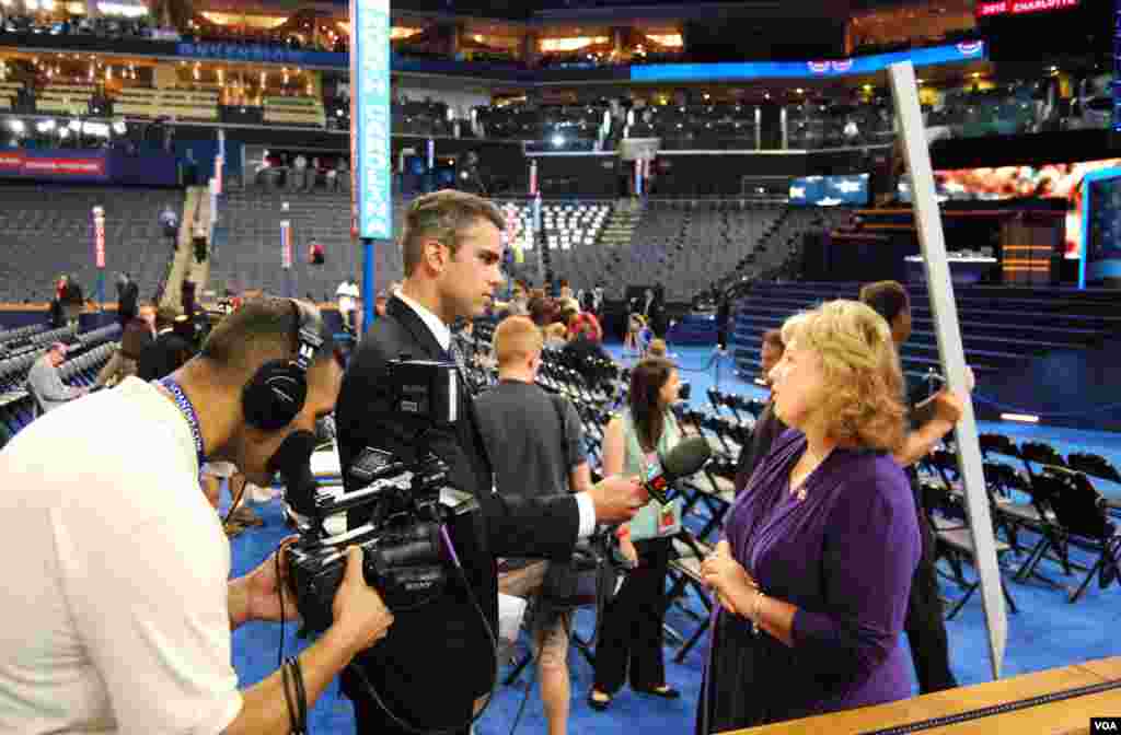 Sean Maroney interviews Elaine Brye on the floor of the DNC on September 4th, 2012. Brye introduced First Lady Michelle Obama at the convention. Photo credits: John Featherly