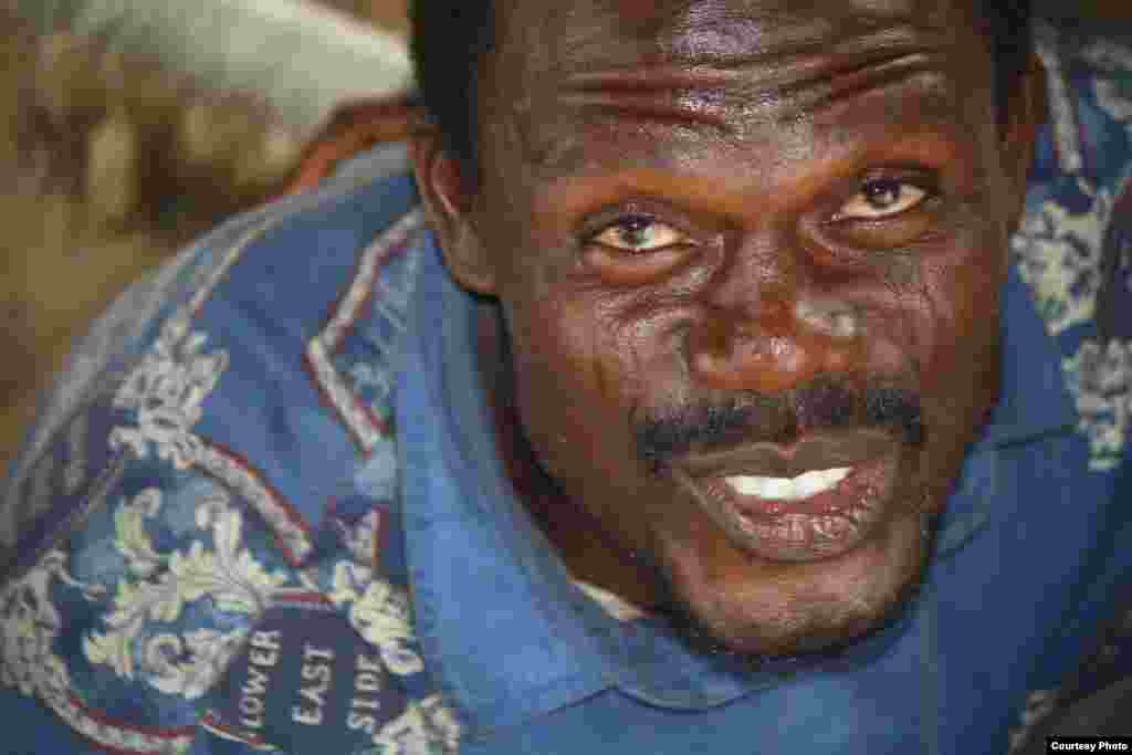 Like many residents, fisherman Pierre Gotun says he was born of water, and cannot live on land, Makoko, Lagos, July 5, 2013. Photo: &nbsp;VOA/H. Murdock.&nbsp;