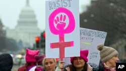 Para peserta Women's March berpawai di Freedom Plaza di Washington, 19 Januari 2019. 