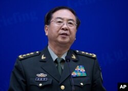 China's Chief of the General Staff Gen. Fang Fenghui speaks during a press briefing with U.S. Joint Chiefs Chairman Gen. Martin Dempsey at the Bayi Building in Beijing, China, April 22, 2013.