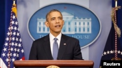 FILE - U.S. President Barack Obama speaks during his end of the year press conference in the briefing room of the White House in Washington, Dec. 19, 2014. 