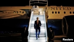 FILE - U.S. Secretary of State John Kerry steps off his plane after arriving in Paris July 26, 2014.