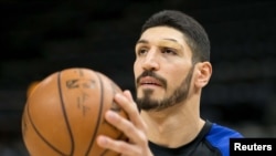 FILE - New York Knicks center Enes Kanter (00) warms up prior to the game against the Utah Jazz at Vivint Smart Home Arena, Dec 29, 2018. (Credit: Russ Isabella-USA TODAY Sports)