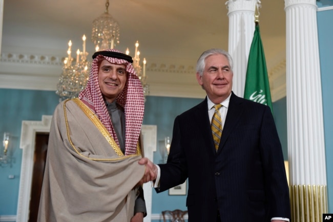 Secretary of State Rex Tillerson shakes hands with Saudi Foreign Minister Adel Al-Jubeir at the State Department in Washington, March 23, 2017.