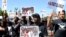 Protesters march through downtown El Cajon, Calif., Oct. 1, 2016, in reaction to the fatal police shooting of unarmed black man, Alfred Olango. Olango was a Ugandan refugee who arrived in the U.S. as a boy. 
