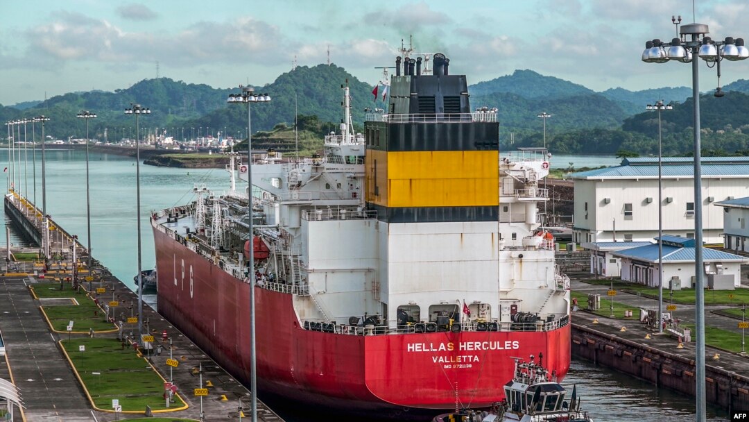 FILE - A cargo ship navigates through the Panama Canal on August 25, 2023. The number of ships allowed through the drought-hit Panama Canal each day will be increased thanks to signs of an improvement in water levels, authorities said on April 15, 2024.