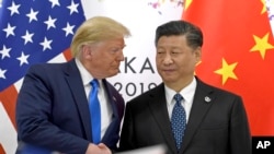 Le Président américain Donald Trump et son homologue chinois Xi Jinping.