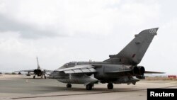 FILE - A British tornado jet prepares for takeoff at RAF Akrotiri in Cyprus.