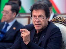 FILE - Pakistan's Prime Minister Imran Khan attends a session of the Shanghai Cooperation Organization summit in Bishkek, Kyrgyzstan, June 14, 2019.