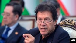 FILE - Pakistan's Prime Minister Imran Khan attends a session of the Shanghai Cooperation Organization summit in Bishkek, Kyrgyzstan, Friday, June 14, 2019. 