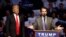 Donald Trump Jr. speaks as Republican presidential candidate Donald Trump listens during a campaign stop in Indianapolis, April 27, 2016.