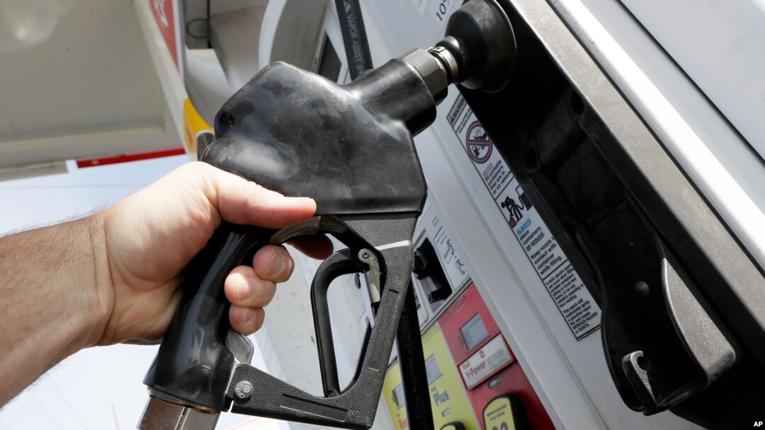 FILE - Gas is pumped at a filling station in Nashville, Tennessee.