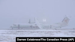 An Air Canada Express flight operated by Pal Airlines skidded off the runway Saturday night, after catching fire at Halifax Stanfield International Airport is seen in Halifax, Nova Scotia, Dec. 29, 2024.