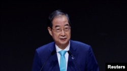 FILE - Han Duck-soo, South Korea's acting president, gives a speech during the opening ceremony of the AI Global Forum in Seoul, South Korea, May 22, 2024.