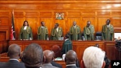 Six Supreme Court judges arrive at court to hear the petition by Kenya's Prime Minister Raila Odinga filed against president-elect Uhuru Kenyatta, March 25, 2013. 