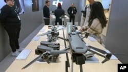 FILE - A DJI Mavic 3 Pro drone is for sale at a DJI store in New York on March 22, 2024. 