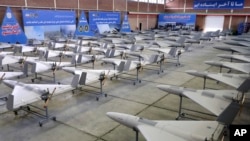 FILE - In this picture released by the official website of the Iranian Army on April 20, 2023, Iran-made drones are displayed in a ceremony.