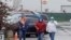 Tyson Fresh Meats plant employees arrive at the plant, April 23, 2020, in Logansport, Ind.