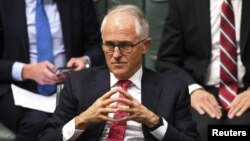 Australian Prime Minister Malcolm Turnbull reacts during House of Representatives Question Time at Parliament House in Canberra, Australia, Aug. 21, 2018.