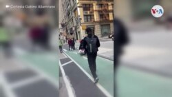 Manifestantes pacíficos enfrentan a personas que vandalizaban una tienda en Nueva York