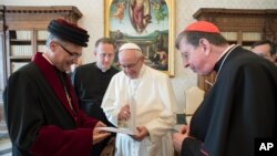 Pope Francis meets members of the joint commission for theological dialogue between the Catholic Church and the Assyrian Church of the East, at the Vatican, Nov. 24, 2017.