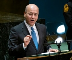 FILE - Iraqi President Barham Salih addresses the 74th session of the United Nations General Assembly, Sept. 25, 2019, at the United Nations headquarters.