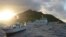 Chinese marine surveillance ship Haijian No. 51 (C) sails near Japan Coast Guard vessels (R and L) and a Japanese fishing boat (front 2nd L) as Uotsuri island, one of the disputed islands, called Senkaku in Japan and Diaoyu in China, is in background, Jul