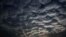 Sun sets behind a patterned cloud formed over the city in Kolkata, West Bengal state, India, Monday, May 18, 2020. A cyclonic storm 'Amphan' has intensified into a super cyclone.