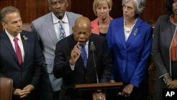 Georgia Rep. John Lewis leads more than 200 Democrats in demanding a vote on measures to expand background checks and block gun purchases by some suspected terrorists, in this frame grab taken from AP video, June 22, 2016.