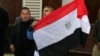 Egypt Releases Al Jazeera Journalists Ahead of Retrial