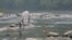 FILE - People enjoy the cool water of the Saluda River in Columbia, S.C., July 28, 2005. 