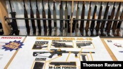 FILE - A view of Gun City gunshop in Christchurch, New Zealand, March 19, 2019. The country has begun to buy back certain guns after shootings in two mosques.