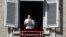 Pope Francis delivers the Angelus noon prayer in St. Peter's Square at the Vatican, Nov. 1, 2020. 