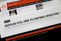 FILE - A photograph of the Rappler website is seen Jan.16, 2018.