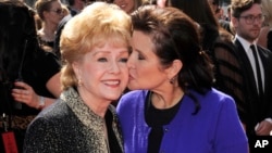 Debbie Reynolds, left, died one day after her daughter, Carrie Fisher.