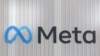 FILE - The logo of Meta is seen at the entrance of the company's temporary stand ahead of the World Economic Forum in Davos, Switzerland, Jan. 18, 2025.