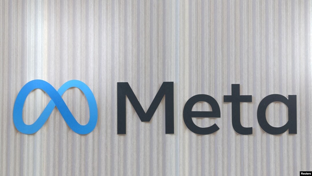 FILE - The logo of Meta is seen at the entrance of the company's temporary stand ahead of the World Economic Forum in Davos, Switzerland, Jan. 18, 2025.