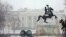 Snow falls at the White House after a winter weather prompted schools and the federal government to close, March 3, 2014 in Washington, D.C.