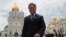 Russian anti-virus programs developer Yevgeny Kaspersky walks in the Kremlin after he was presented with a state award in Moscow, June 12, 2009. 