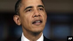 President Barack Obama speaks about the situation in Libya in the Grand Foyer of the White House, February 23, 2011, in Washington.