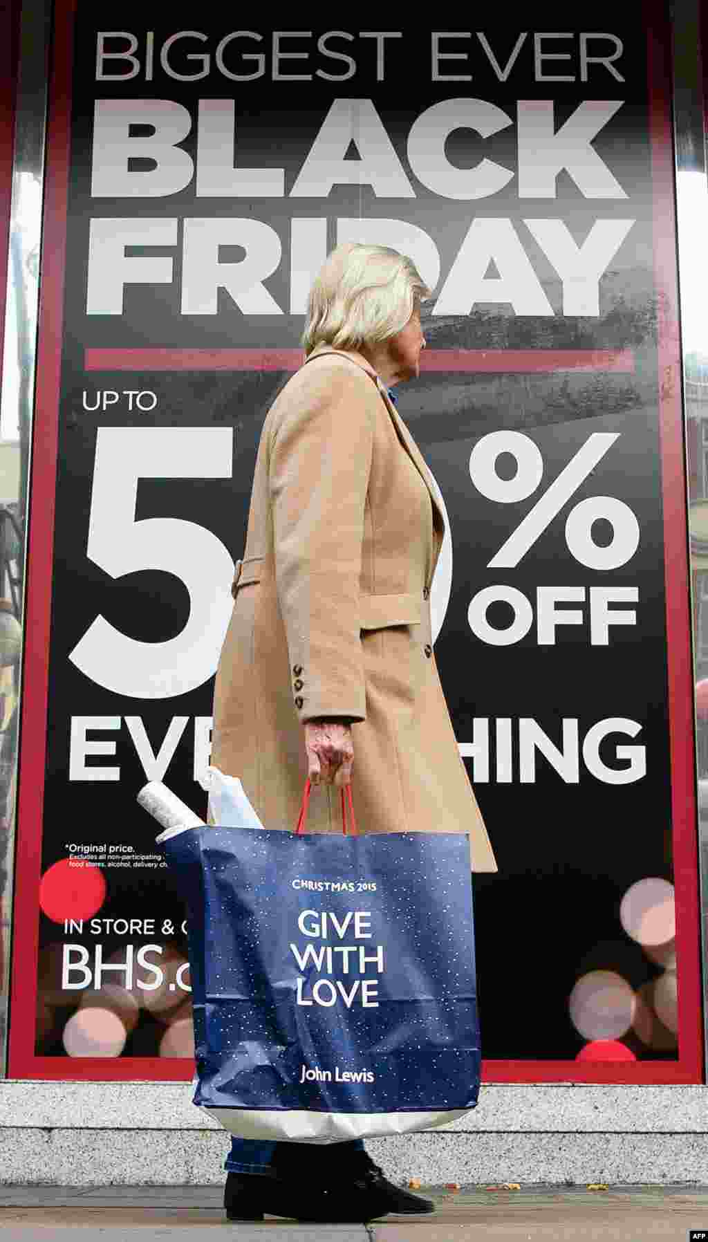 Retail stores display &quot;Black Friday&quot; advertisements and banners on Oxford Street in central London, England, as the annual retail event takes place Friday. Black Friday is a sales offer originating from the US where retailers slash prices on the day after the Thanksgiving holiday.