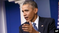 President Barack Obama speaks during a news conference in the Brady Press Briefing Room of the White House in Washington, Dec. 19, 2014.