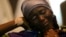 Wata mahafiyar daya daga cikin'yan mata fiye da 200 da aka sace a garin Chibok wadda kuma ba'a tantance ko wacece ba ta hasala yayin da ake taron manema labaran a Legas ranar 5 ga watan Yuni, 2014.