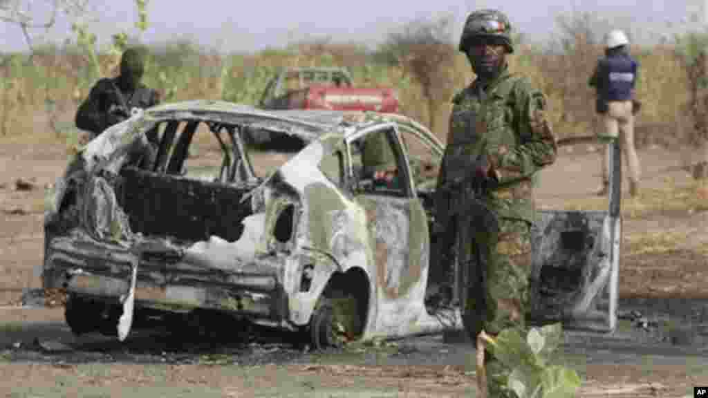 Soldiers gather at a former camp for Islamic extremists near Marte, Nigeria.