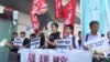 李飞访港讲述基本法 泛民团体场外抗议