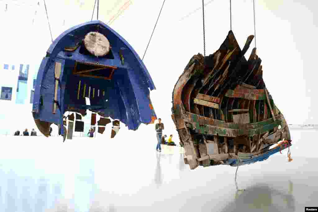 Remnants of boats used by refugees and recovered along the Greek coast are displayed as part of a project by Mexican artist Guillermo Galindo ahead of the opening of Germany's biggest art fair "Documenta 14" in Kassel, German, June 7, 2017.