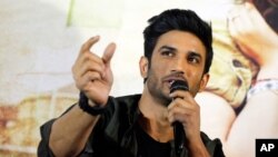 FILE - Bollywood actor Sushant Singh Rajput speaks during a press conference to promote his movie "Raabta" in Ahmadabad, India, May 30, 2017.