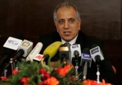 FILE - U.S. chief negotiator, Zalmay Khalilzad speaks during a news conference at Serena Hotel in Kabul , Afghanistan.