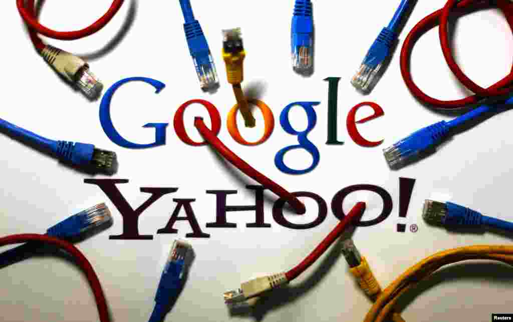 An illustration shows the logos of Google and Yahoo connected with LAN cables in a Berlin office. The U.S. National Security Agency has tapped into communications links used by Google and Yahoo to move huge amounts of email and other user information among overseas data centers, the Washington Post reported Wednesday.